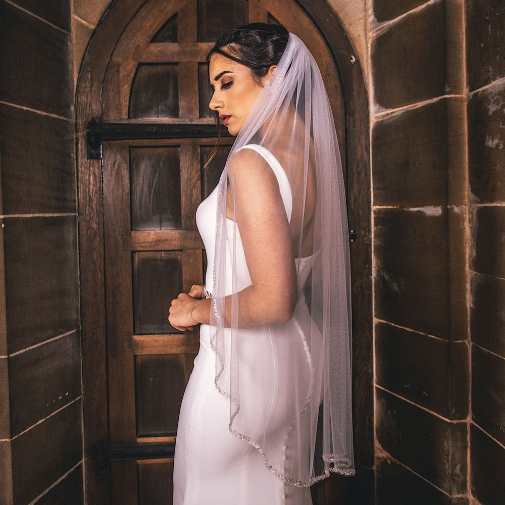
            
                Load image into Gallery viewer, Fingertip Wedding Veil Single tier with Silver Beaded Edge PBV9058
            
        